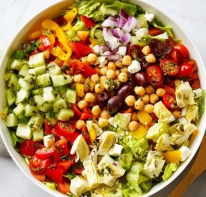 A vibrant Italian Chopped Salad featuring fresh ingredients and colorful vegetables.